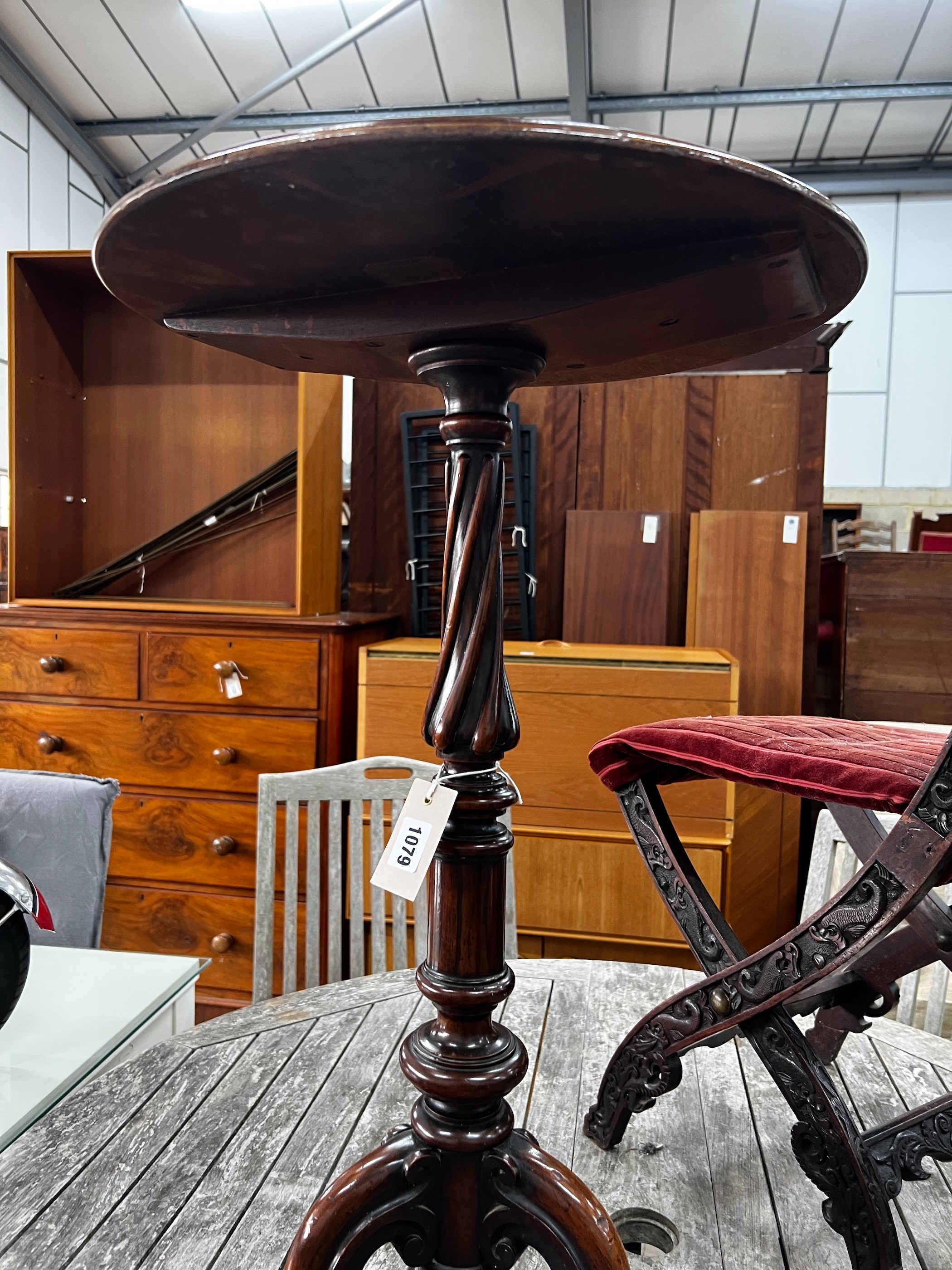 A Victorian and later circular mahogany wine table, bears T & G Seddon paper label, diameter 46cm, height 74cm